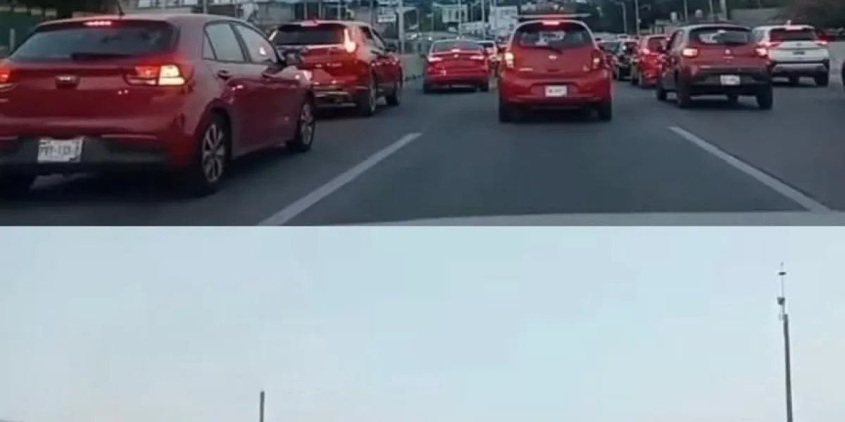 Auto abandonado en autopista México-Cuernavaca, a la altura de Tabachines, genera tráfico tras perder una llanta.